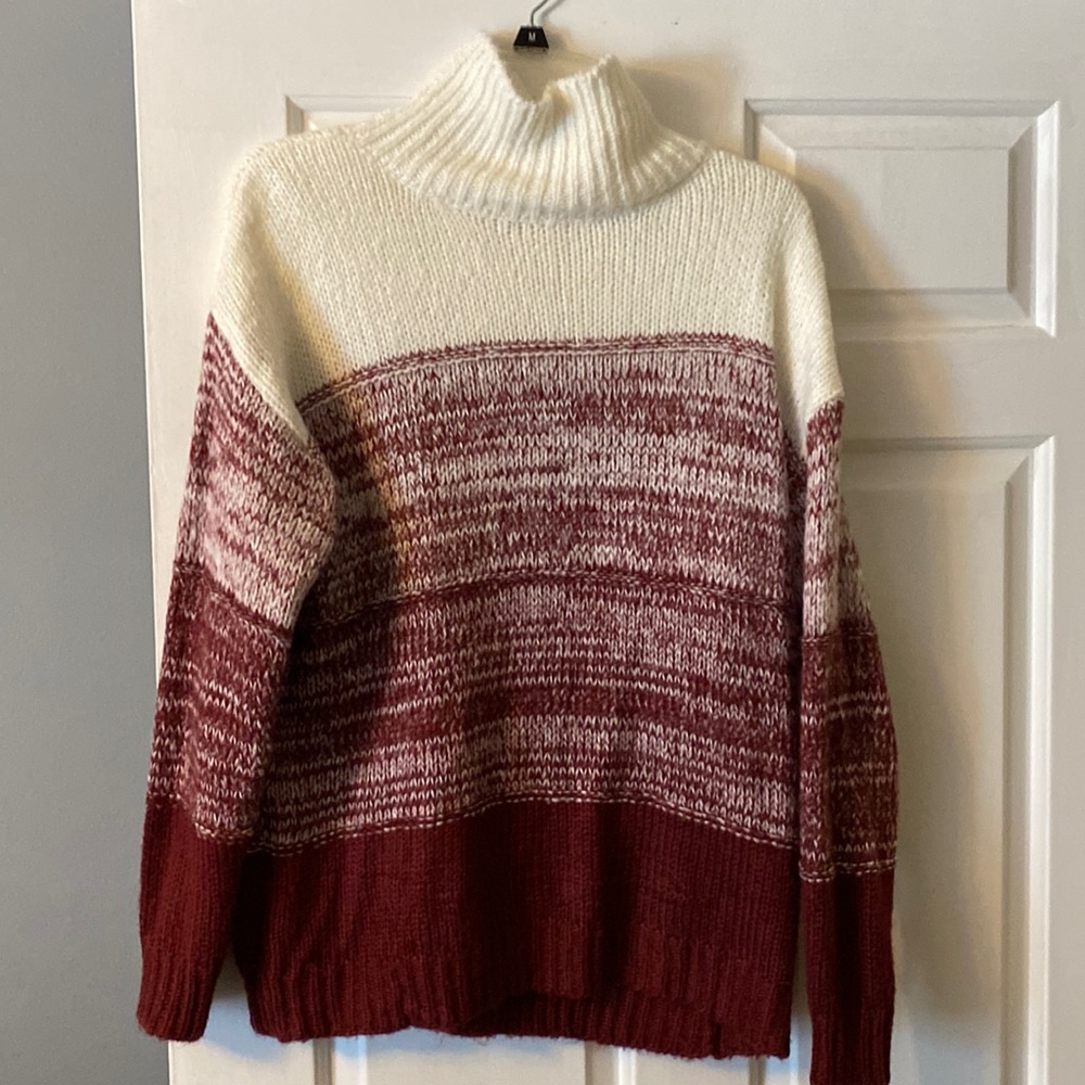 Maroon and cream sweater size Medium